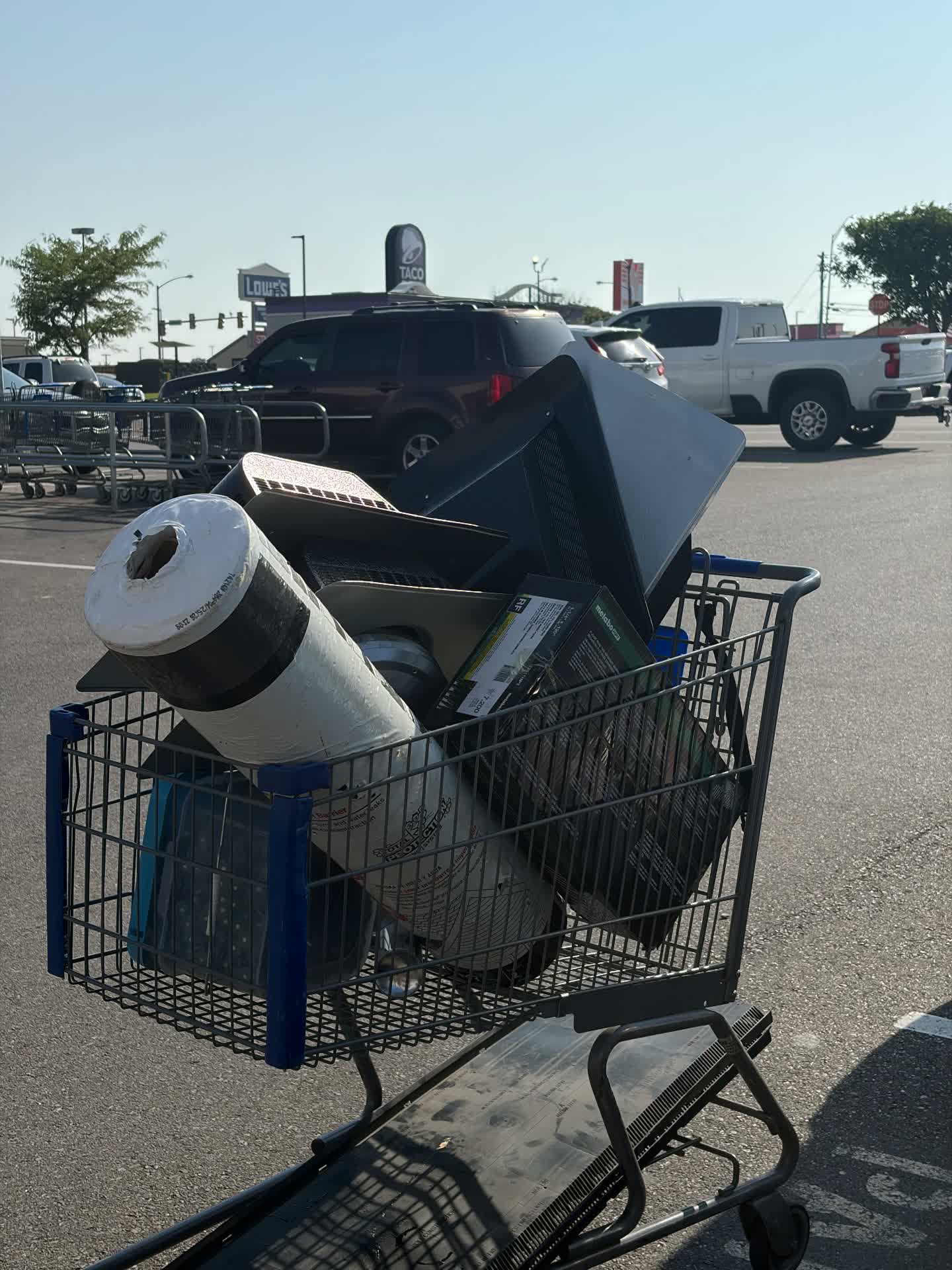 A supply run cart loaded with roofing materials