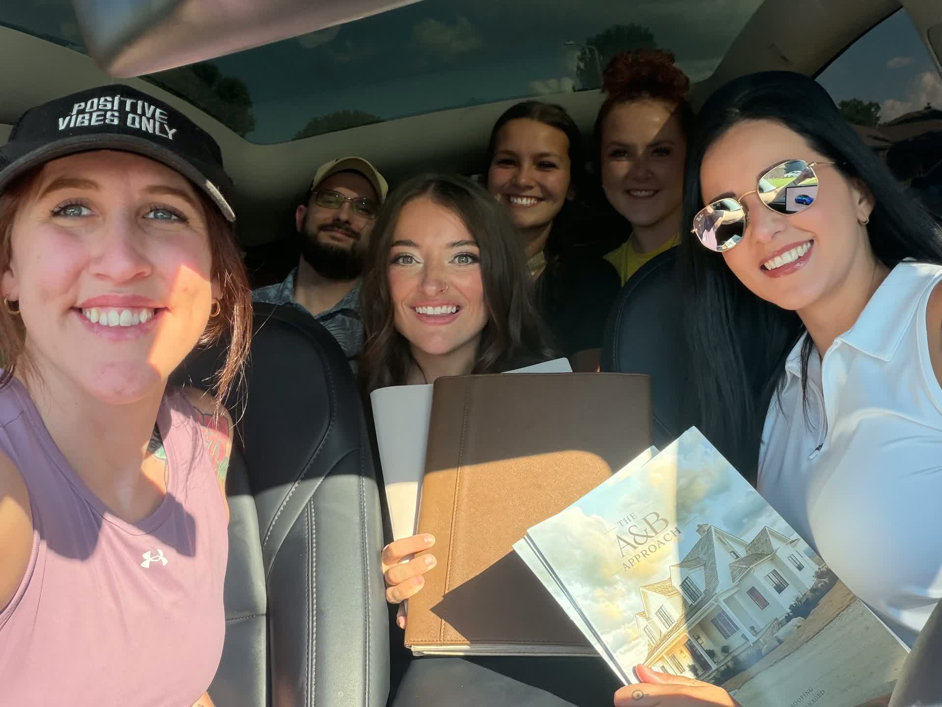 The A & B team piled in the car between appointments