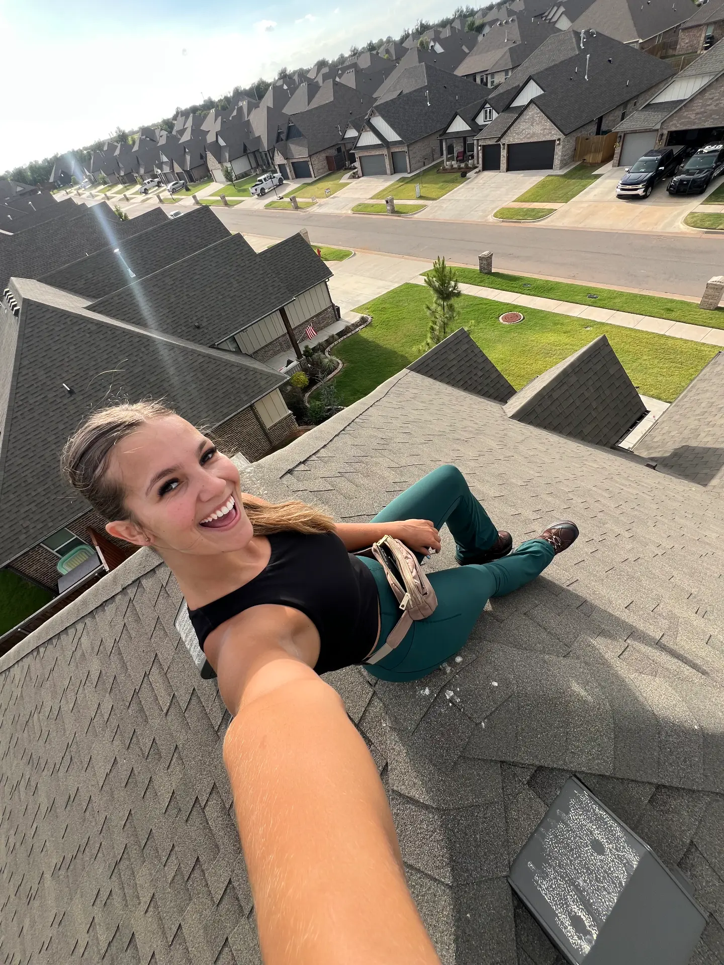 A rooftop selfie overlooking the neighborhood