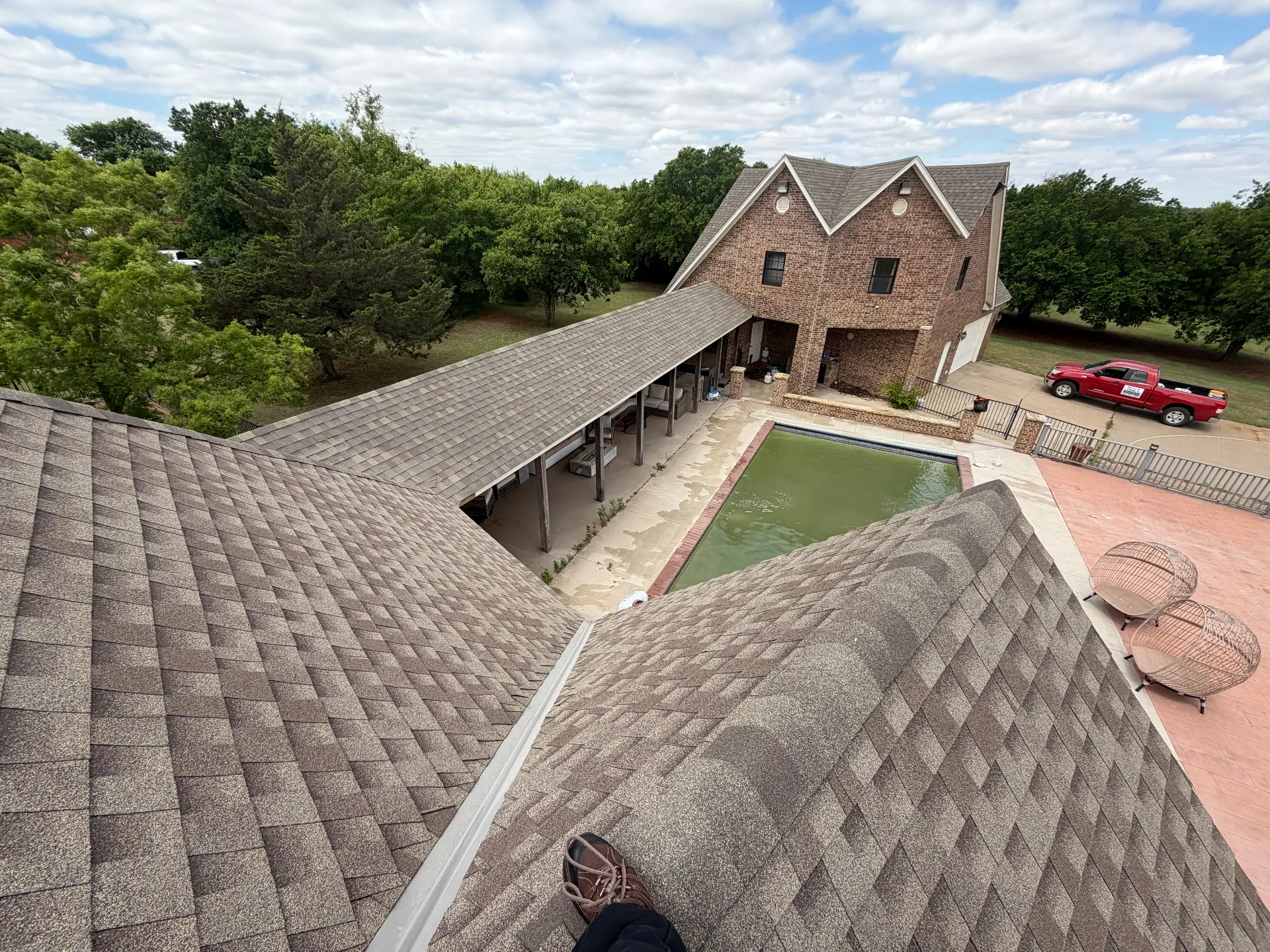 The view from the ridge over a poolside courtyard